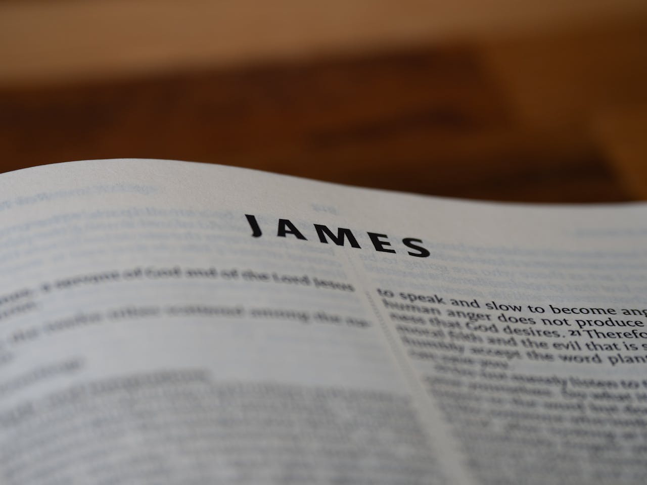 A close-up view of the book of James from the Bible, emphasizing religious study.